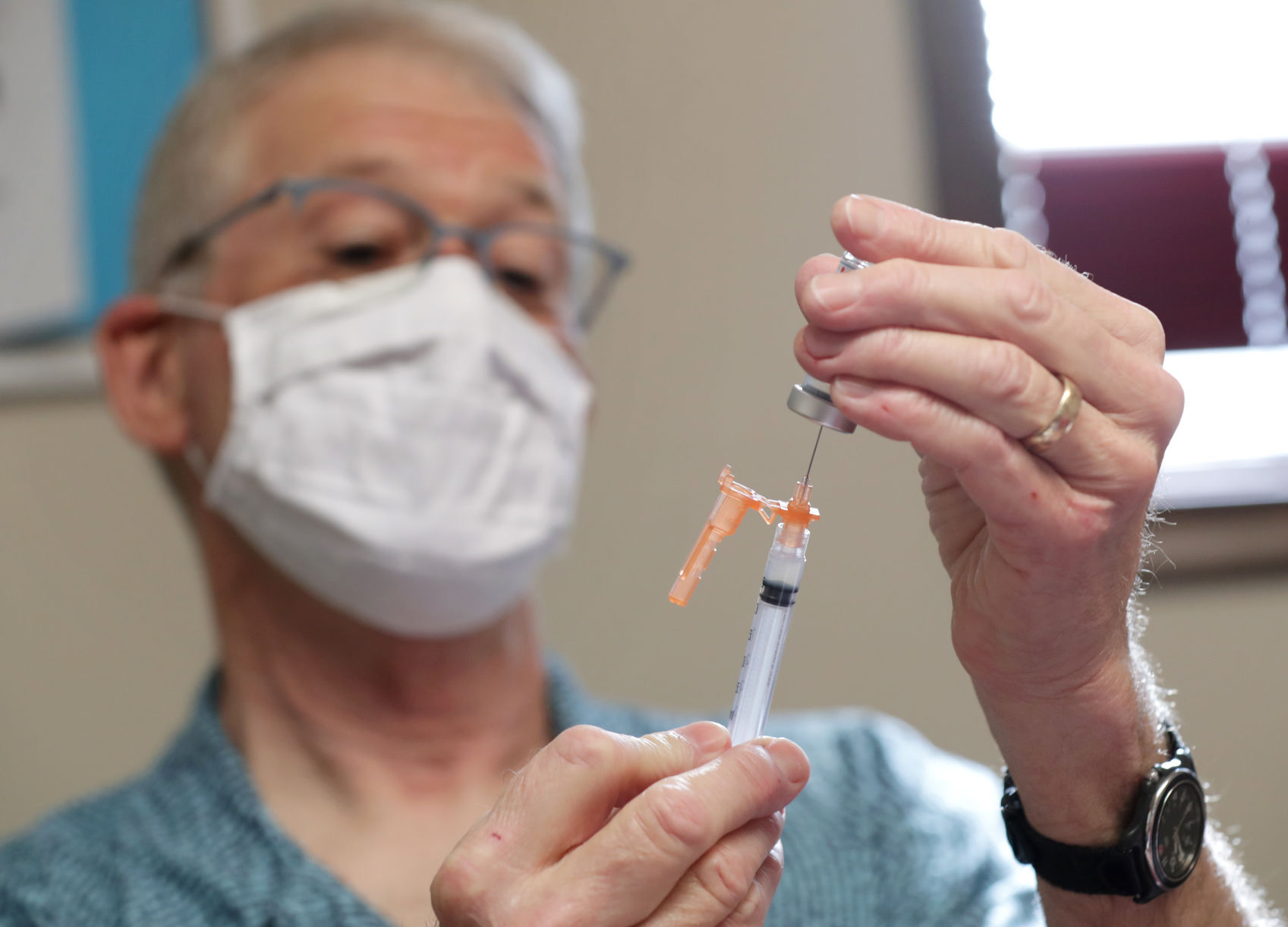 Hanson preparing syringe